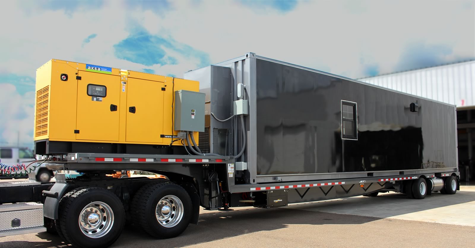 Mobile machine shop trailer with large generator